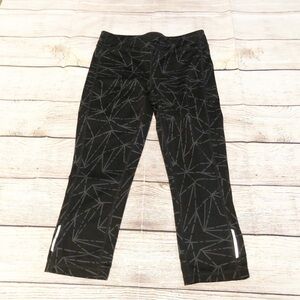 ATHLETA Girl Chaturanga Capri Leggings Black w/ Gray Geo Print Size L (12)